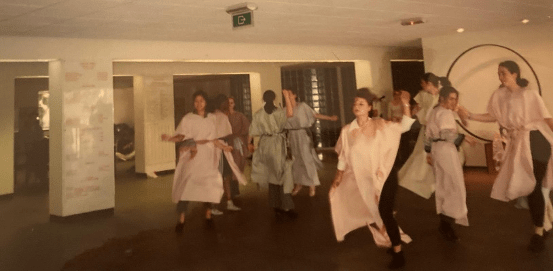 A group of people dancing

Description automatically generated with medium confidence